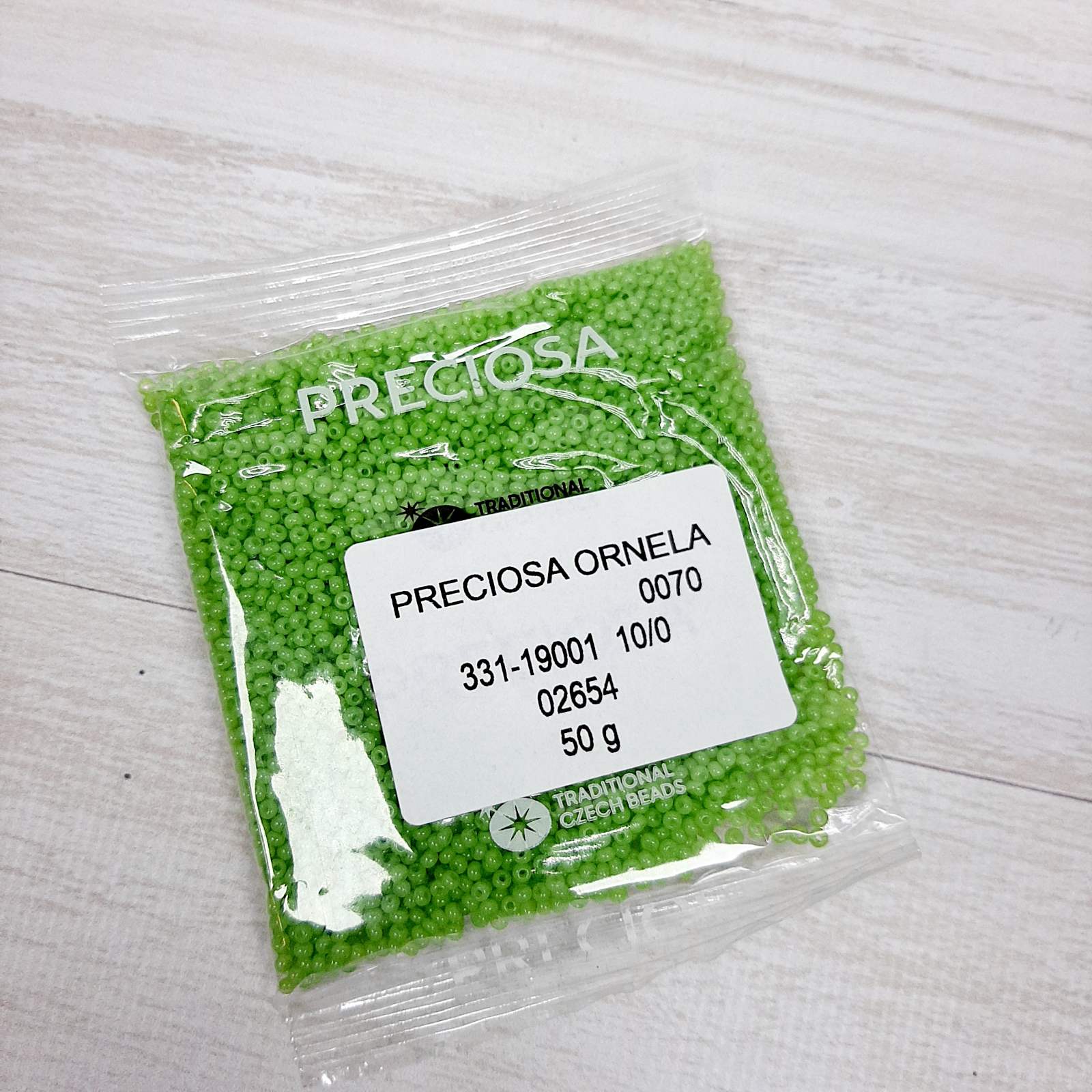 Бісер 02654 Preсiosa 10/0 салатовий глянець 25г