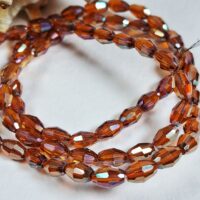 Скло овал 4*6мм 68шт темне шампанське 20315