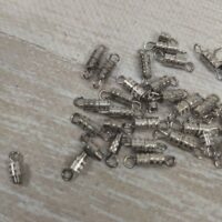 Застібка, що закручується, латунь 12*4мм срібло 5шт