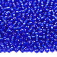 Бісер 35056 Preсiosa 10/0 темно-синій прозорий з білим отвором 25г