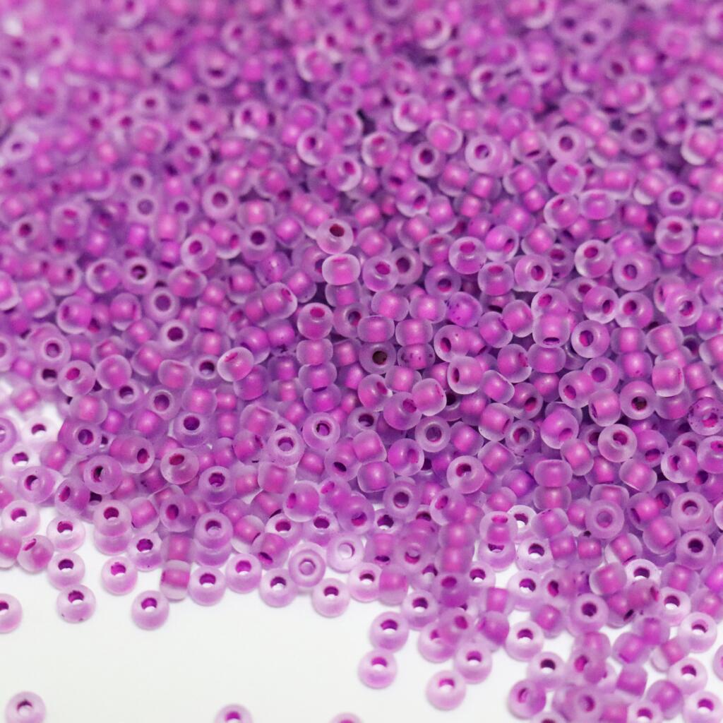 Бісер 08728/1 Preсiosa 10/0 фіолетовий кристальний з неоновим отвором матовий 25г