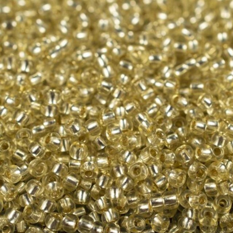 Бісер 78251 Preciosa 10/0 жовтий кристальний з блискучим срібним отвором 25г