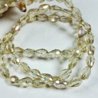 Скло крапля 6*8мм 60-65шт з переливом темний лимон d68309