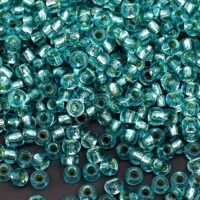 Бісер 78665 Preciosa 10/0 бірюзовий кристальний з блискучим срібним отвором 25г