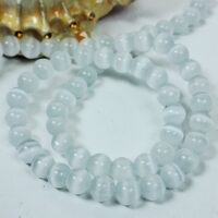 Котяче око 6мм штучний білий 35-36см 32243