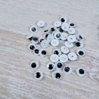 Очі круглі пришивні 10мм чорно-білі 10шт