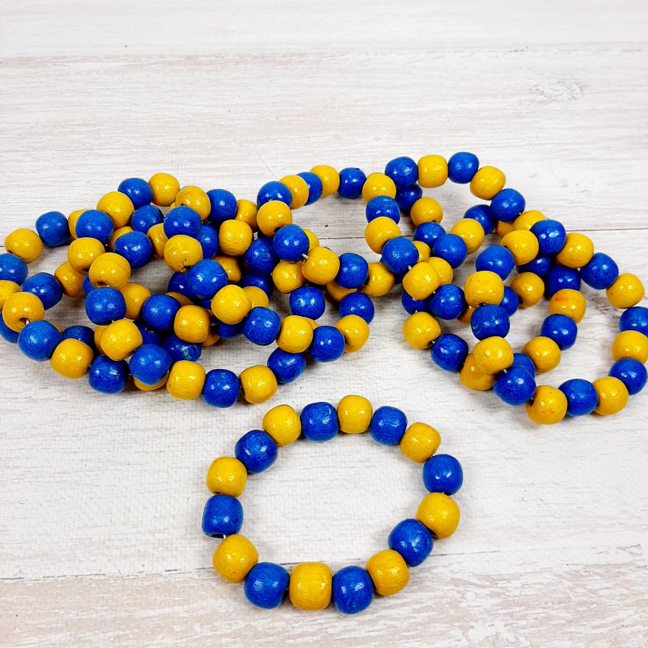 Браслет дерево 20см ОПТ01-01 синьо-жовтий