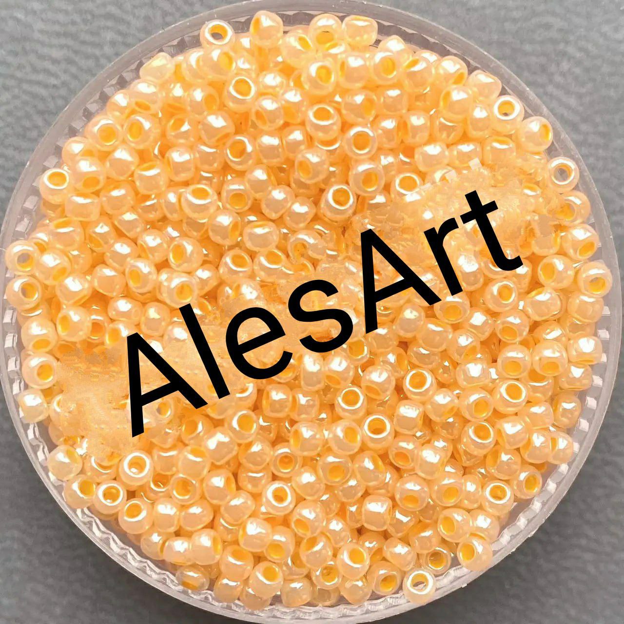 Бісер TOHO Round 11/0 4г 0148 світло-оранжевий перлина