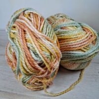 Сток акрил меланж 100г/130м жовто-оливкова