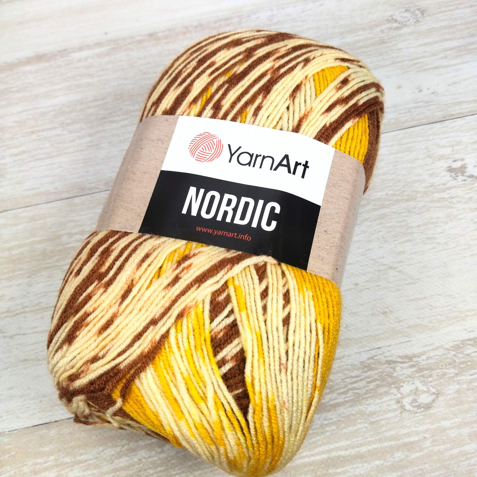 Ярнарт Нордік 150г/510м 656 коричнево-жовтий