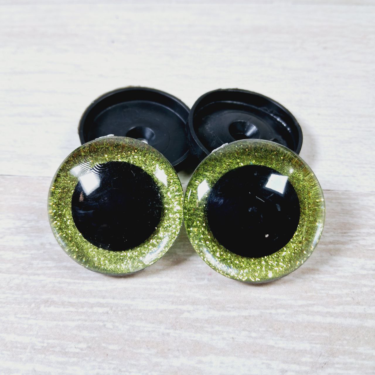 Очі круглі блискучий кант 40мм салатові 1пара ГВ0040б11