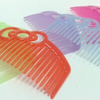 Гребешок пластиковый цветной 4,5*7см/19зуб. 570488